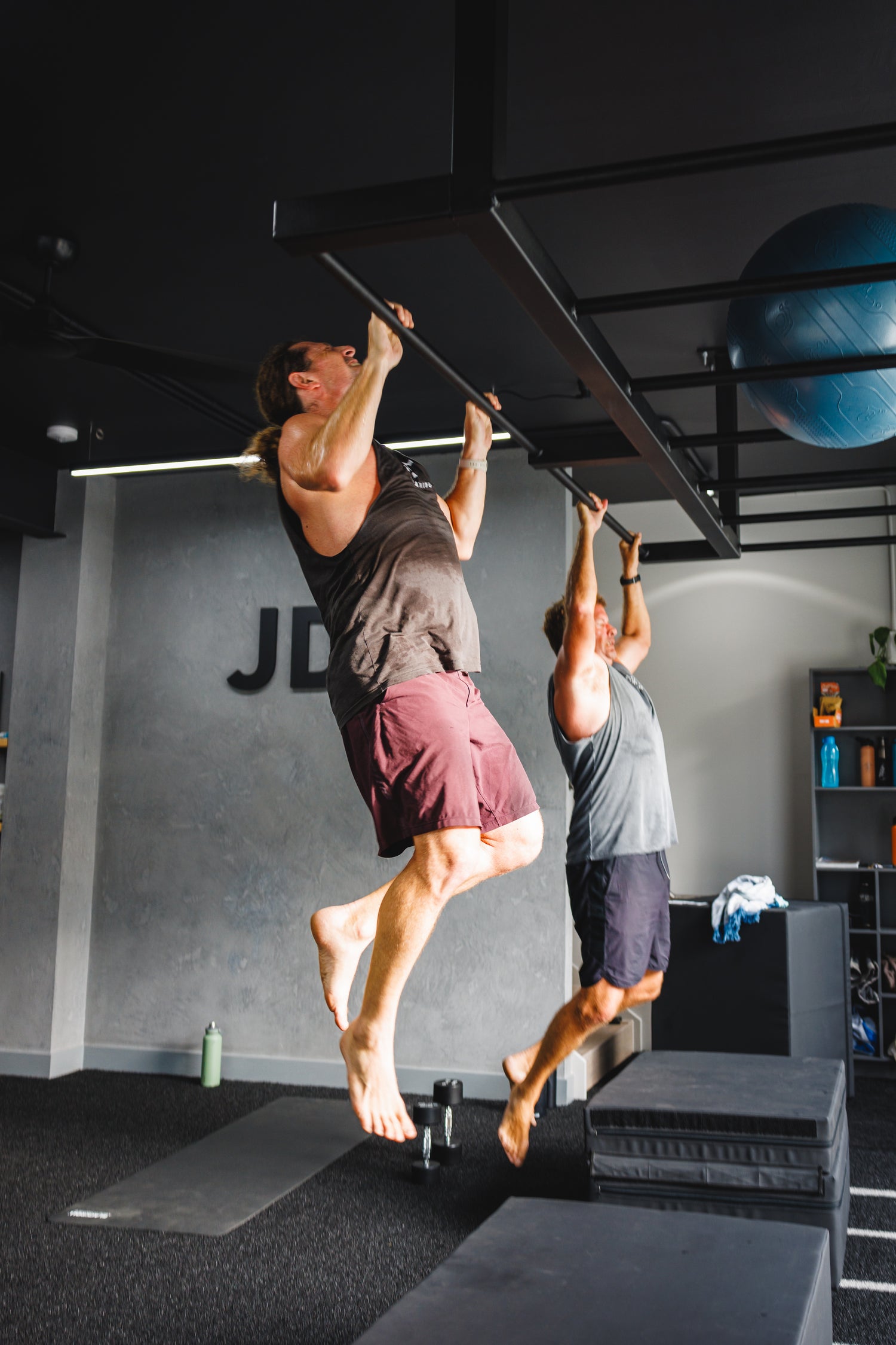 group classes performing pull ups